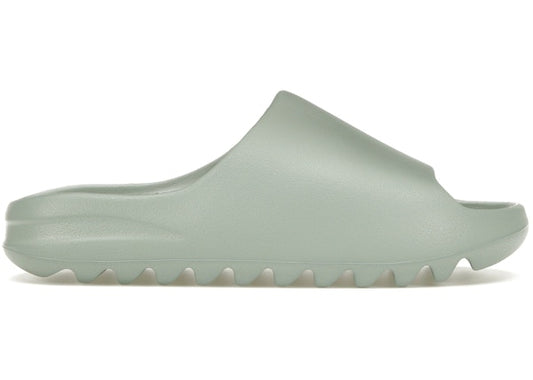 https://res.cloudinary.com/dyql5hig8/image/upload/v1715699414/migrated/store_DnMPYKzVQGEOzQwBk4N9j/adidas-Yeezy-Slide-Salt-Product.jpg